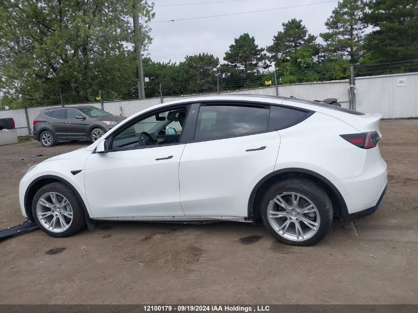 2022 Tesla Model Y VIN: 7SAYGDEE1NF450830 Lot: 12100179