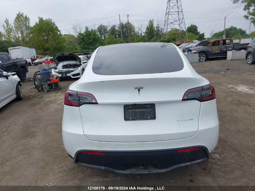 2022 Tesla Model Y VIN: 7SAYGDEE1NF450830 Lot: 12100179