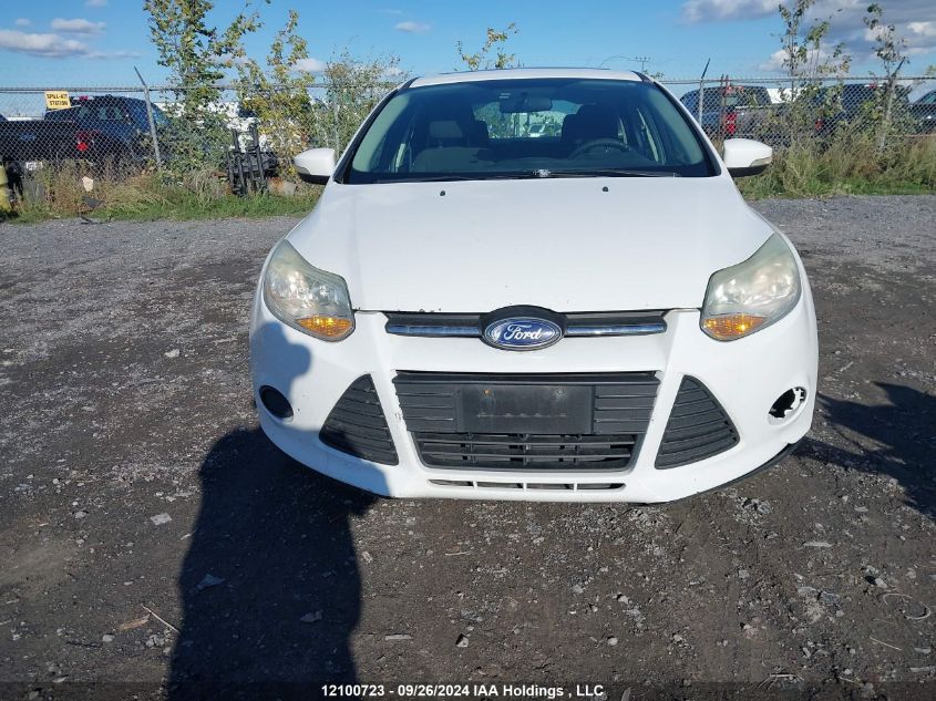 2014 Ford Focus Se VIN: 1FADP3F28EL220828 Lot: 12100723