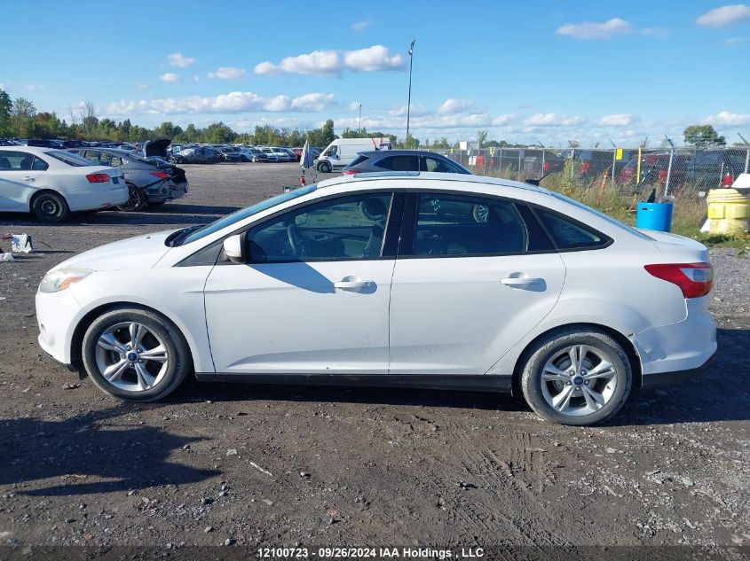 2014 Ford Focus Se VIN: 1FADP3F28EL220828 Lot: 12100723