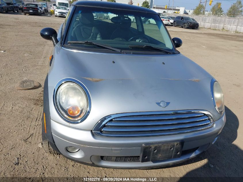 2009 Mini Cooper Hardtop VIN: WMWMF335X9TT68817 Lot: 12102278