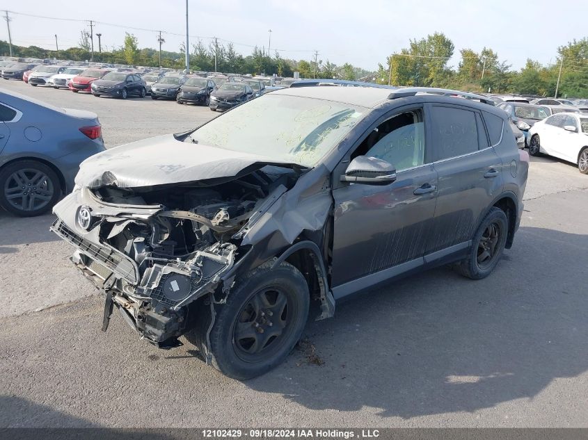 2T3ZFREV7GW296722 2016 TOYOTA RAV 4 - Image 2