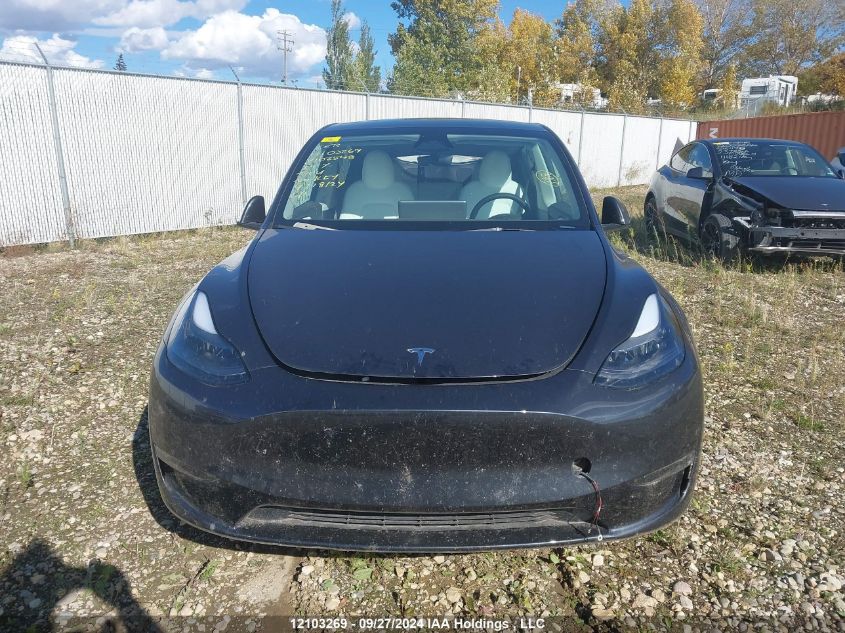 2024 Tesla Model Y VIN: 7SAYGDEE3RF102548 Lot: 12103269