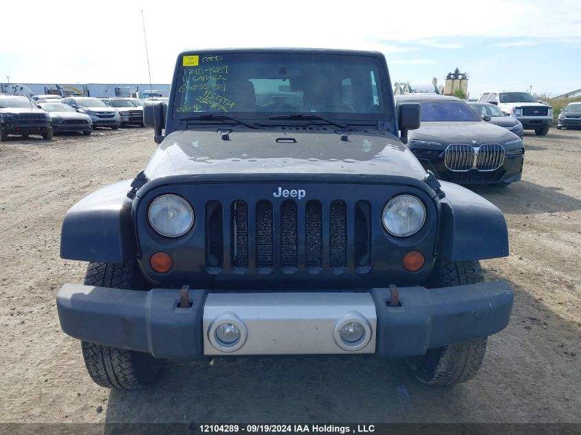 2011 Jeep Wrangler Unlimited Sahara VIN: 1J4BA5H11BL635434 Lot: 12104289