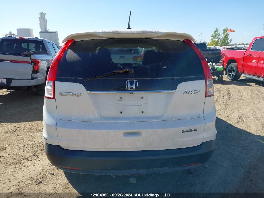 2014 Honda Cr-V VIN: 2HKRM4H9XEH128861 Lot: 12104886