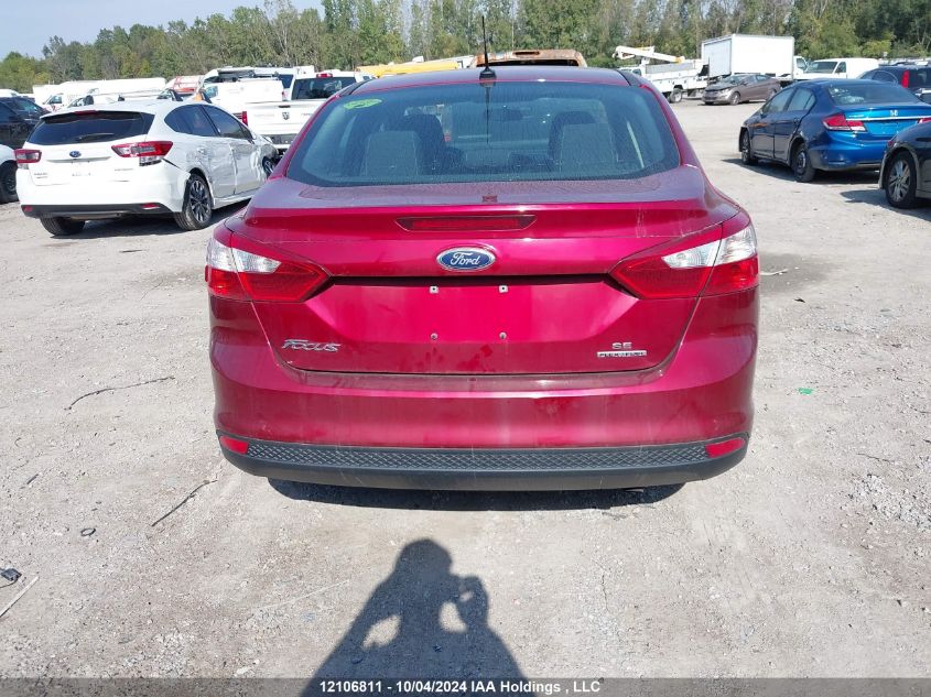 2013 Ford Focus VIN: 1FADP3F23DL273404 Lot: 12106811