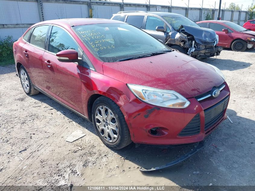 2013 Ford Focus VIN: 1FADP3F23DL273404 Lot: 12106811