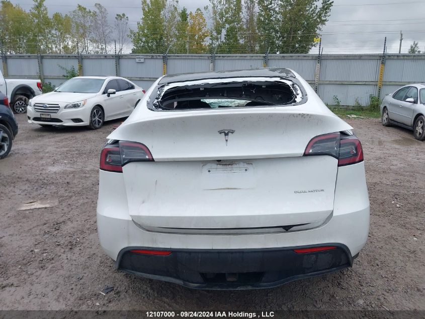 2023 Tesla Model Y VIN: 7SAYGDEE8PF772352 Lot: 12107000