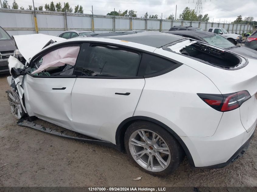 2023 Tesla Model Y VIN: 7SAYGDEE8PF772352 Lot: 12107000