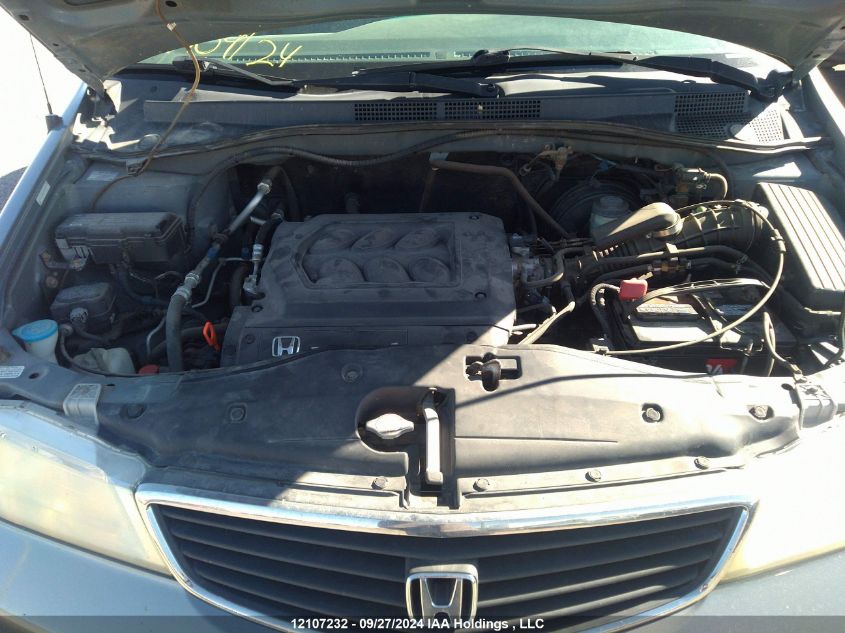 2001 Honda Odyssey VIN: 2HKRL18671H011515 Lot: 12107232