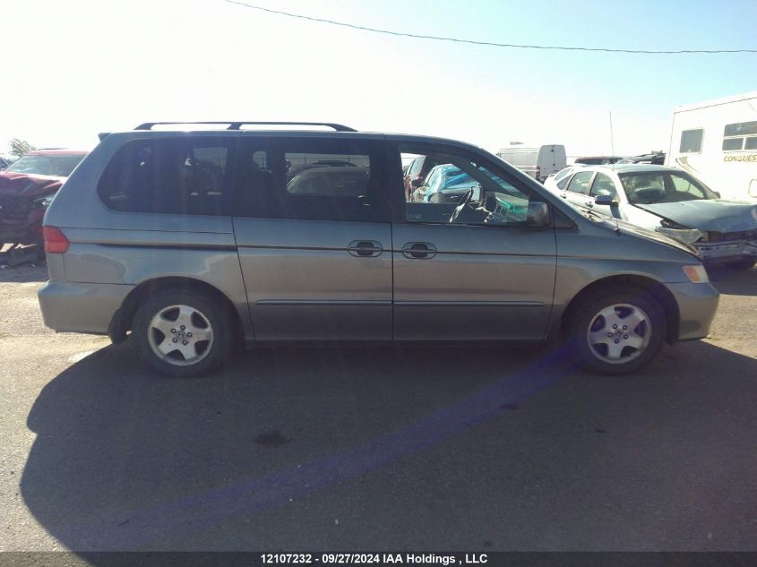 2001 Honda Odyssey VIN: 2HKRL18671H011515 Lot: 12107232