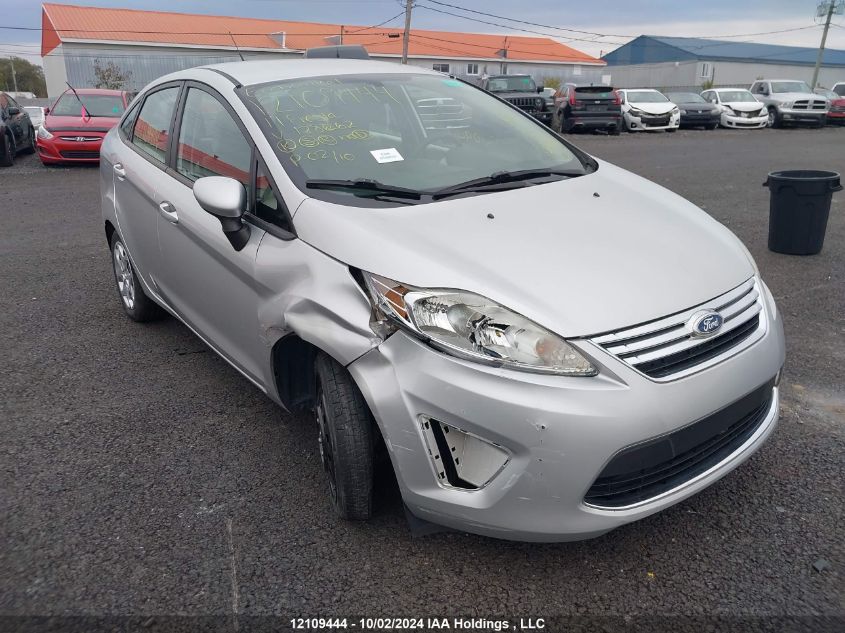 2011 Ford Fiesta Se VIN: 3FADP4BJXBM128262 Lot: 12109444