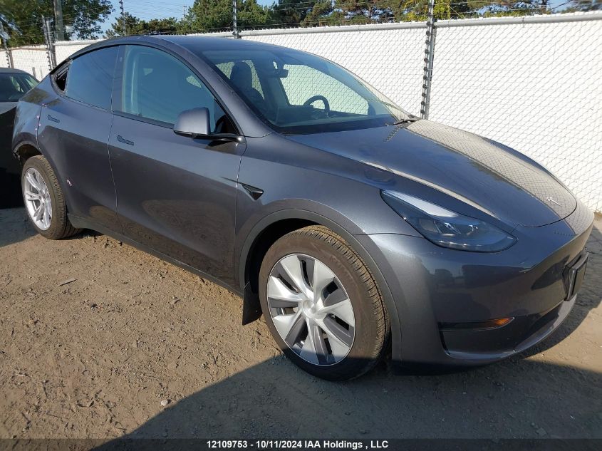 2023 Tesla Model Y VIN: LRWYGDFD7PC163914 Lot: 12109753