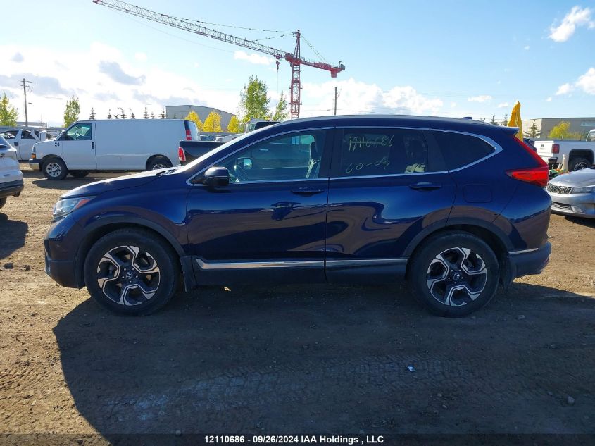 2019 Honda Cr-V Touring VIN: 2HKRW2H97KH110067 Lot: 12110686