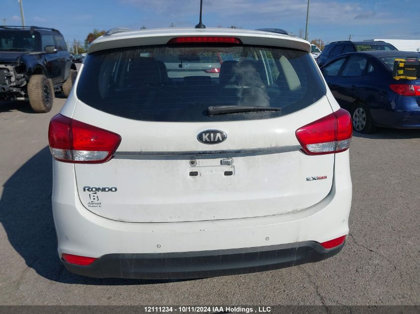 2014 Kia Rondo VIN: KNAHU8A33E7063474 Lot: 12111234