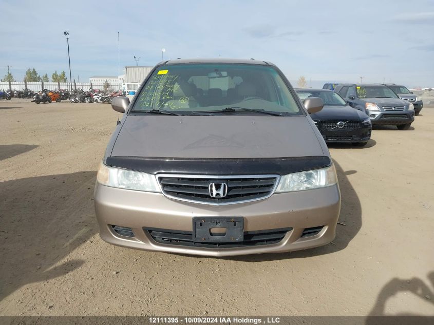 2004 Honda Odyssey Exl VIN: 2HKRL18934H003393 Lot: 12111395