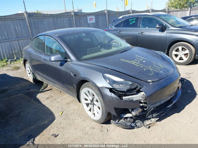 2022 Tesla Model 3 VIN: 5YJ3E1EA1NF375765 Lot: 12112574