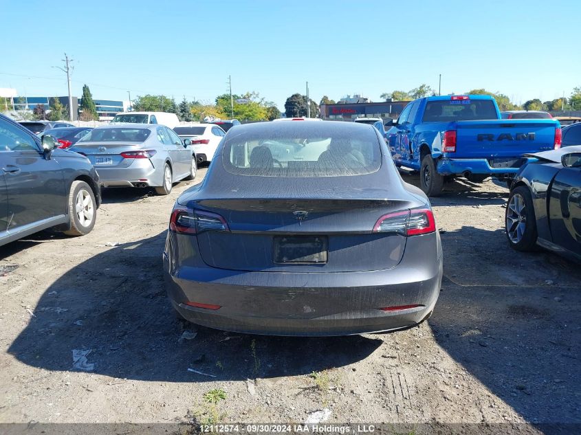 2022 Tesla Model 3 VIN: 5YJ3E1EA1NF375765 Lot: 12112574