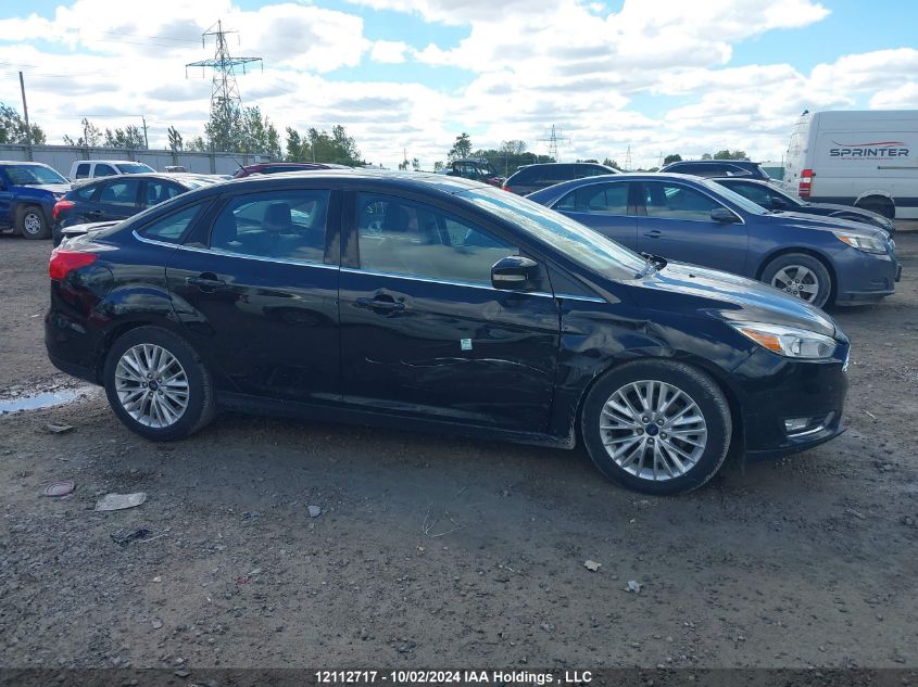 2016 Ford Focus VIN: 1FADP3J2XGL323128 Lot: 12112717