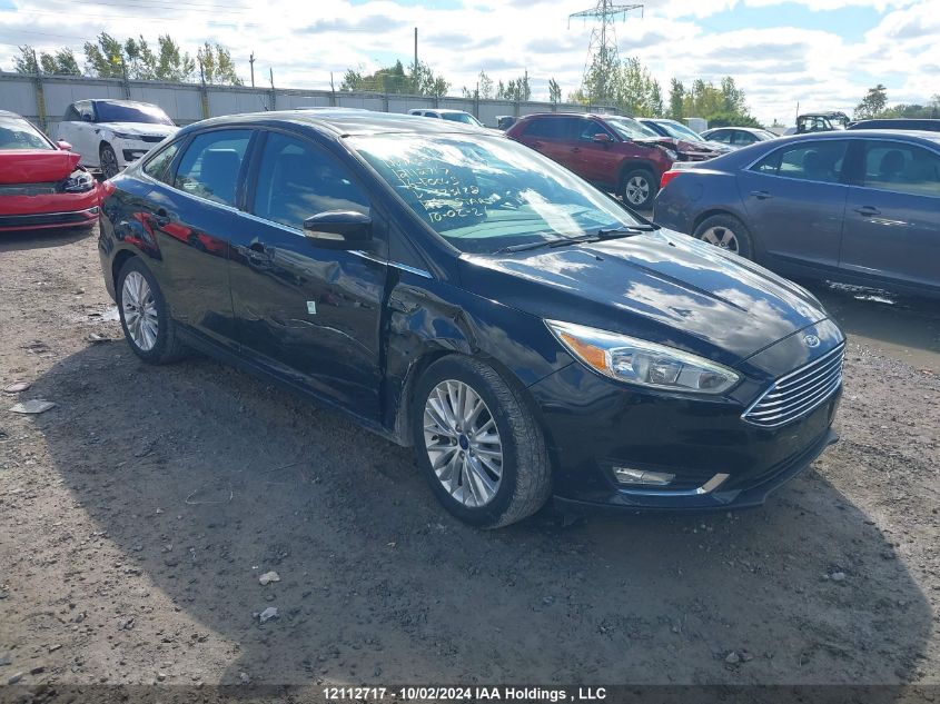 2016 Ford Focus VIN: 1FADP3J2XGL323128 Lot: 12112717