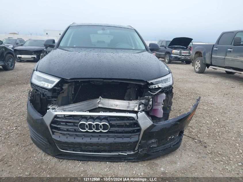 2016 Audi Q3 VIN: WA1GFCFS7GR000617 Lot: 12112938