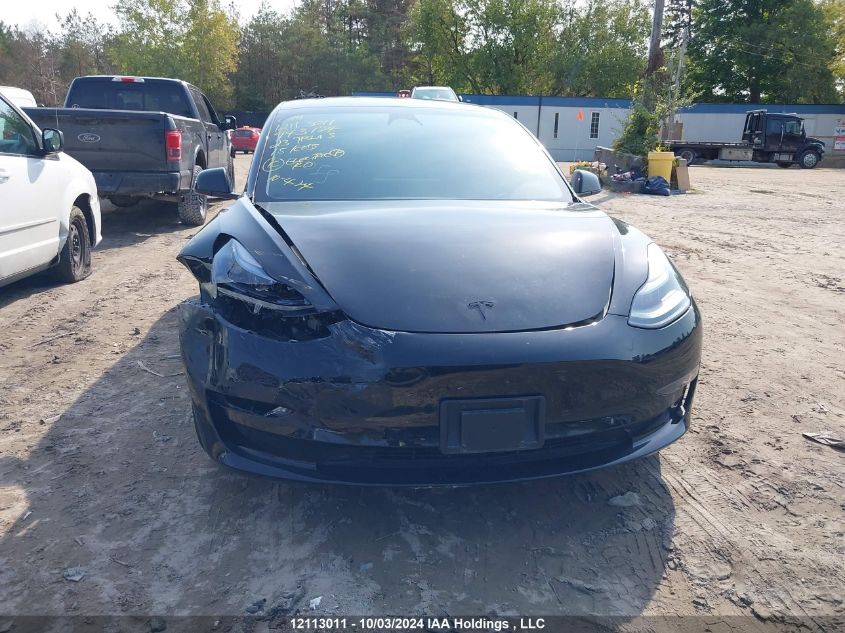 2023 Tesla Model 3 VIN: LRW3E1EB2PC943124 Lot: 12113011