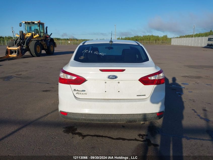 2014 Ford Focus S VIN: 1FADP3E22EL384996 Lot: 12113066