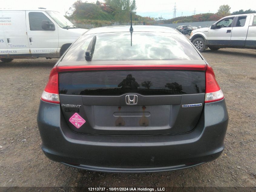 2010 Honda Insight VIN: JHMZE2H5XAS801057 Lot: 12113737