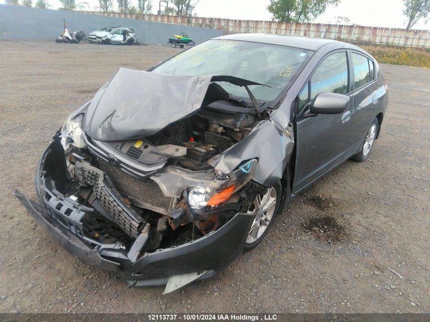 2010 Honda Insight VIN: JHMZE2H5XAS801057 Lot: 12113737