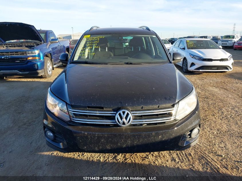 2015 Volkswagen Tiguan VIN: WVGJV7AX9FW585107 Lot: 12114429