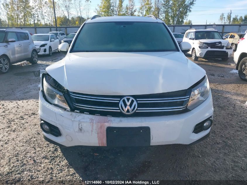 2014 Volkswagen Tiguan VIN: WVGHV3AX4EW588583 Lot: 12114860