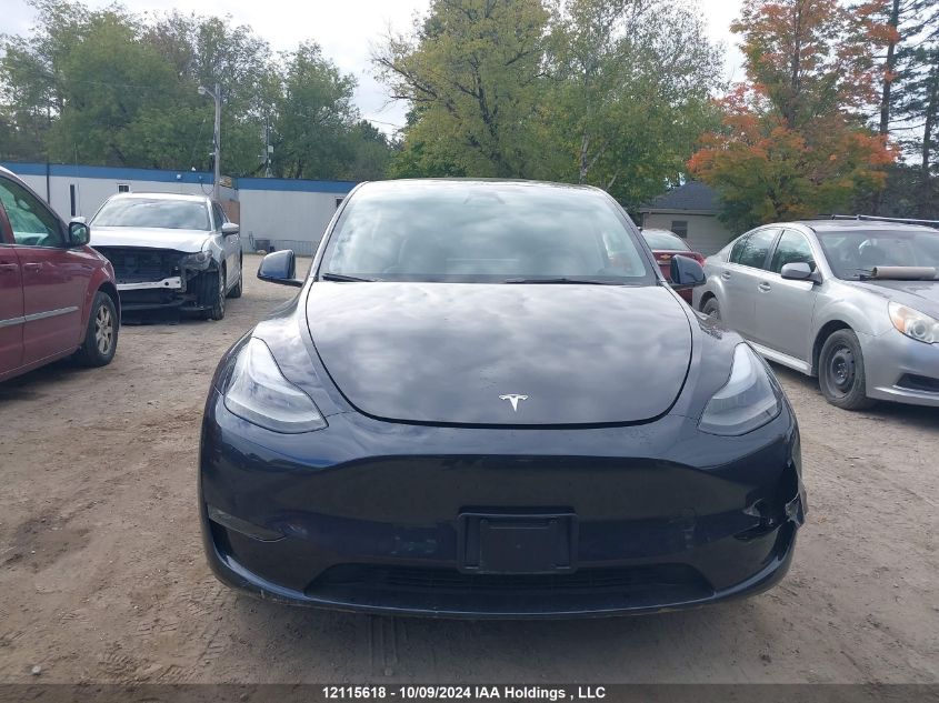 2024 Tesla Model Y VIN: 7SAYGDEE2RF071549 Lot: 12115618