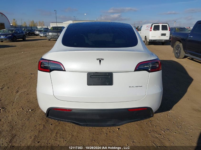 2023 Tesla Model Y VIN: 7SAYGDEE8PF765076 Lot: 12117353