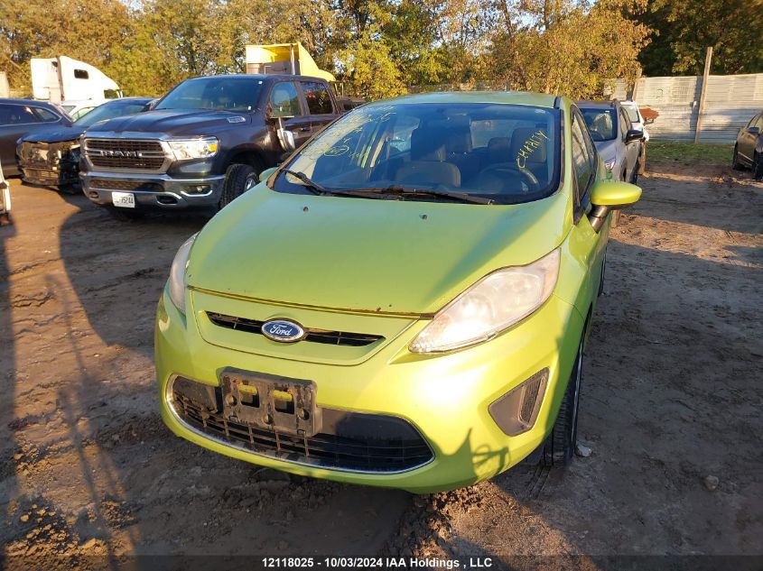 2011 Ford Fiesta Se VIN: 3FADP4EJXBM104104 Lot: 12118025