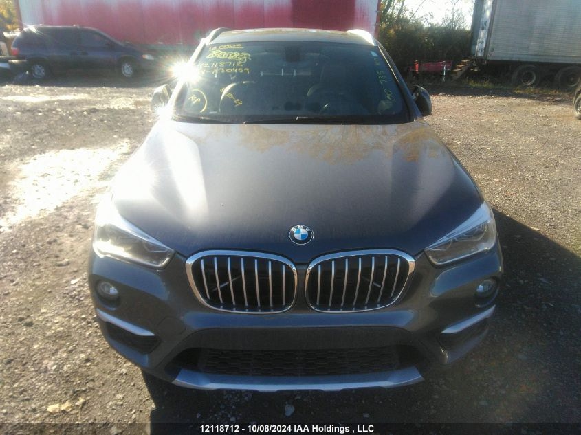 2018 BMW X1 xDrive28I VIN: WBXHT3C31J5K30459 Lot: 12118712