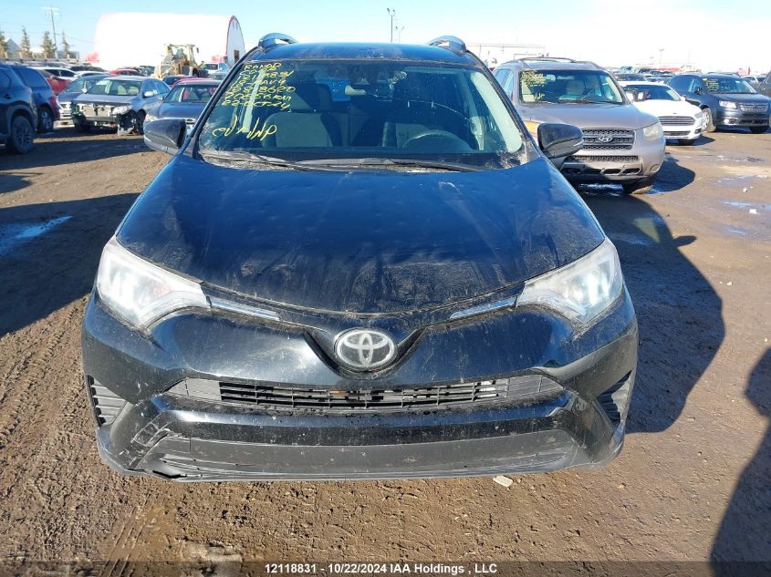 2018 Toyota Rav4 Le VIN: 2T3BFREV2JW818620 Lot: 12118831