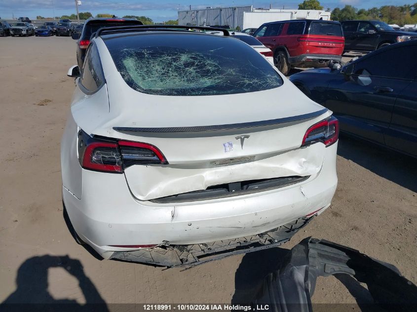 2021 Tesla Model 3 VIN: 5YJ3E1EA2MF047267 Lot: 12118991