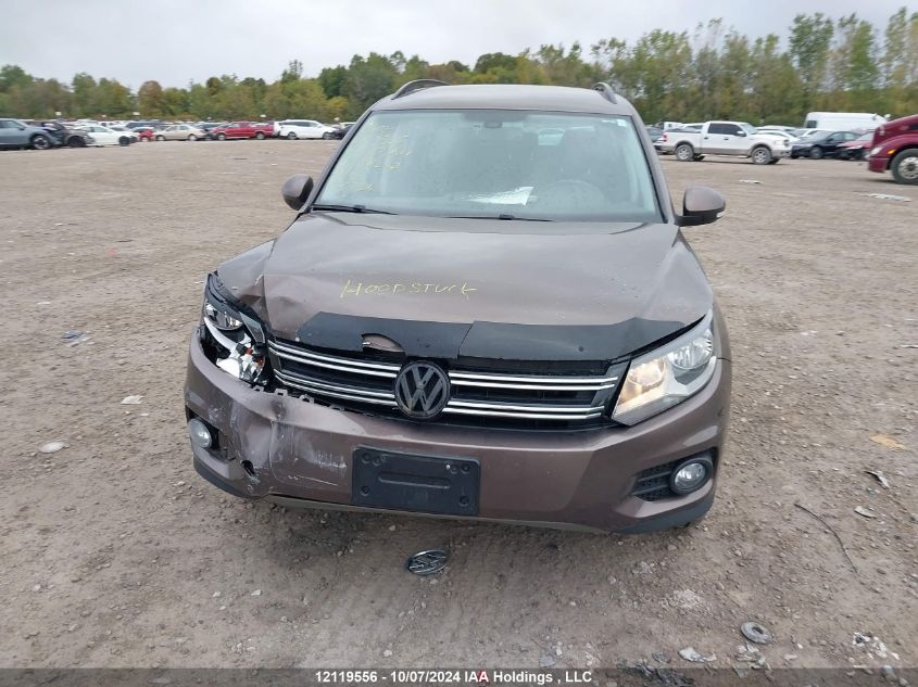 2015 Volkswagen Tiguan VIN: WVGJV7AX9FW108242 Lot: 12119556