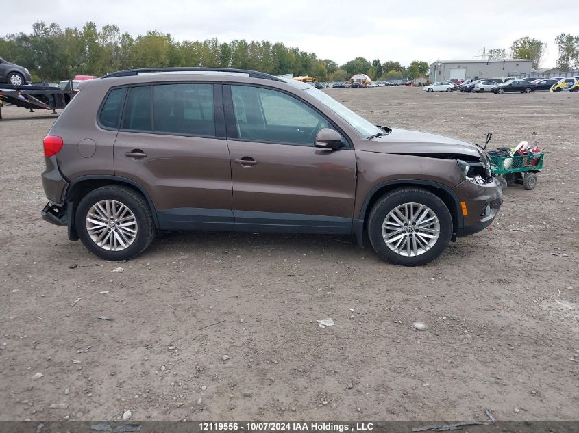 2015 Volkswagen Tiguan VIN: WVGJV7AX9FW108242 Lot: 12119556