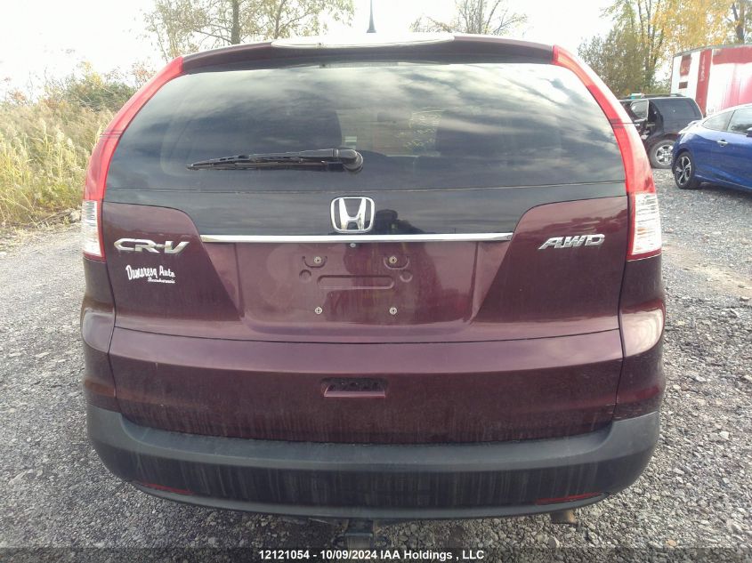 2014 Honda Cr-V VIN: 2HKRM4H3XEH112879 Lot: 12121054