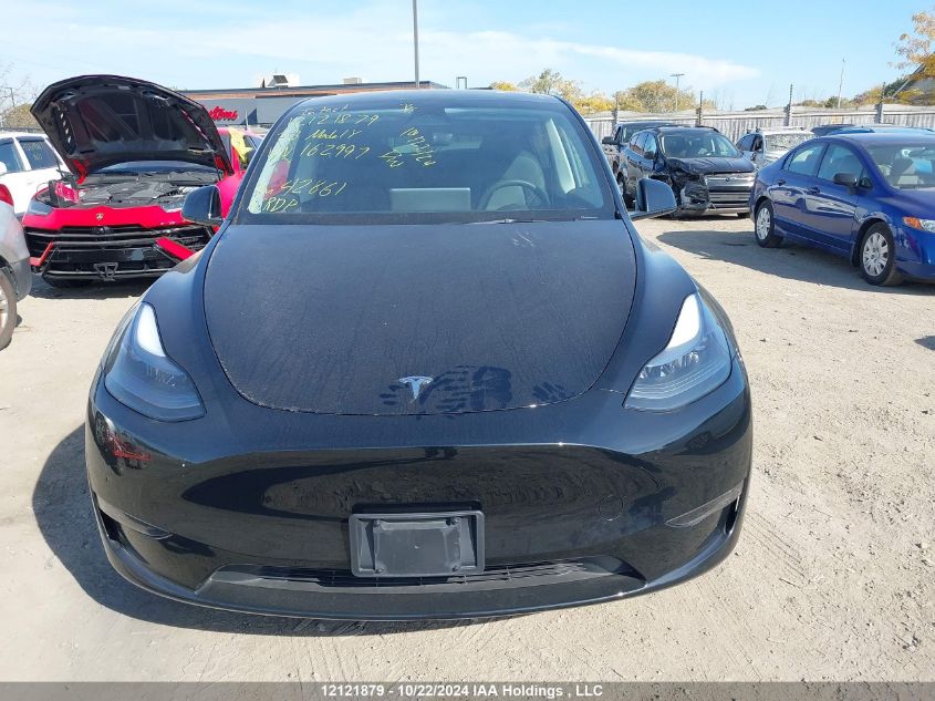 2023 Tesla Model Y VIN: LRWYGDEE7PC162997 Lot: 12121879