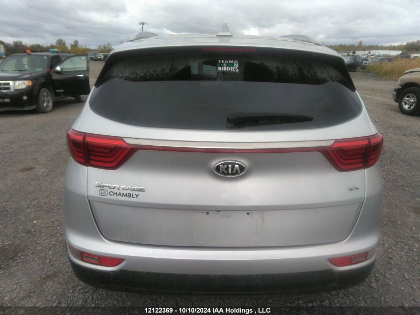 2018 Kia Sportage VIN: KNDPNCAC0J7359108 Lot: 12122369