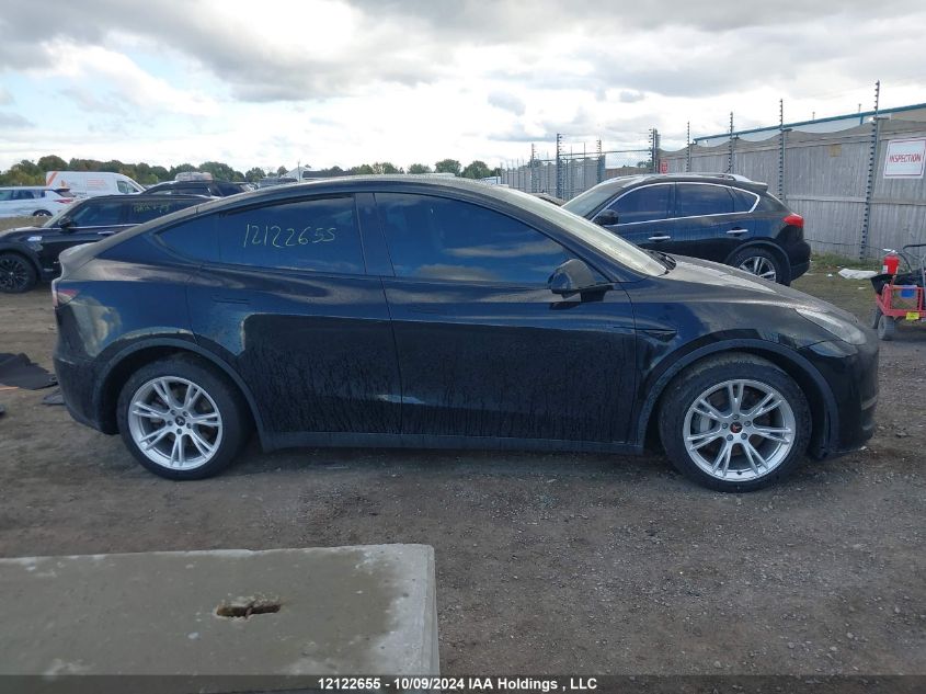 2022 Tesla Model Y VIN: 7SAYGAEEXNF430350 Lot: 12122655