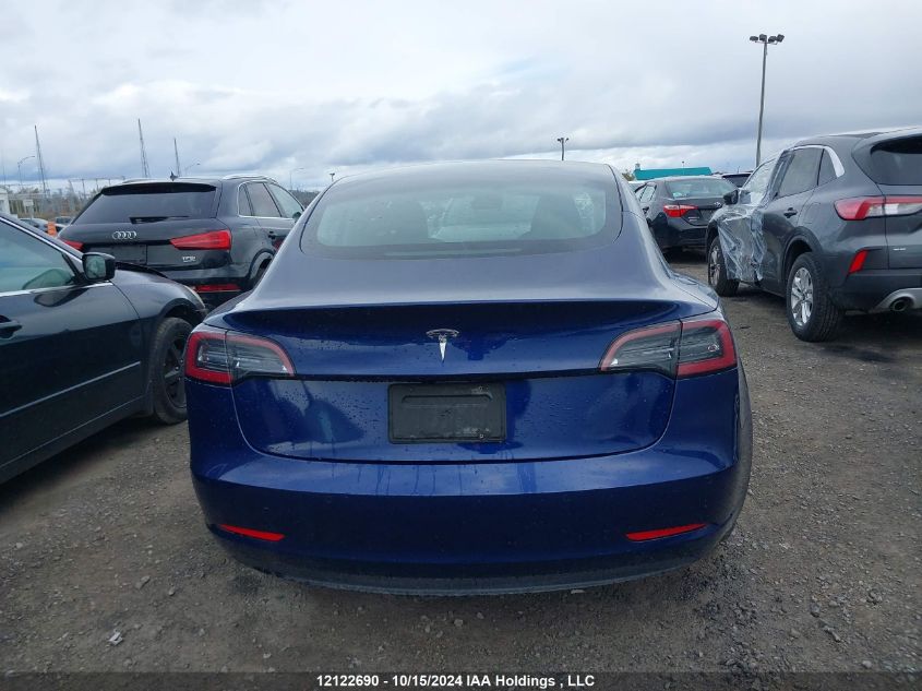 2022 Tesla Model 3 VIN: 5YJ3E1EB1NF301822 Lot: 12122690