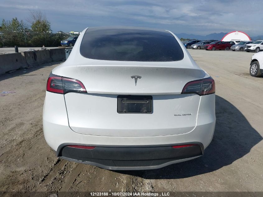 2023 Tesla Model Y VIN: 7SAYGDEE1PF619862 Lot: 12123188