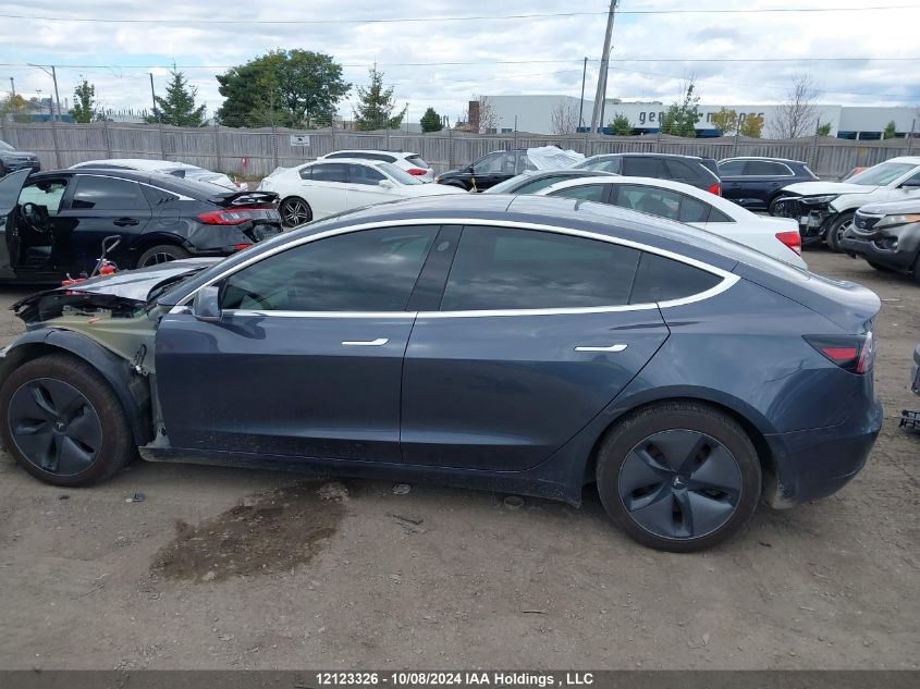 2019 Tesla Model 3 VIN: 5YJ3E1EB2KF205712 Lot: 12123326