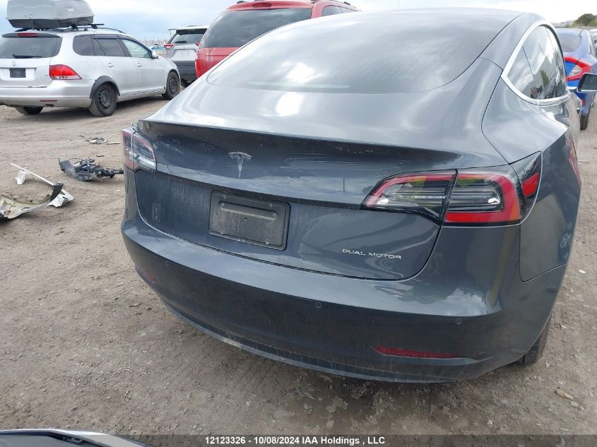 2019 Tesla Model 3 VIN: 5YJ3E1EB2KF205712 Lot: 12123326