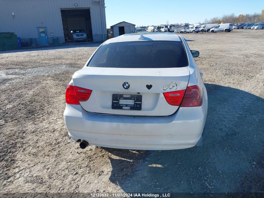 2010 BMW 3 Series VIN: WBAPG7C52AA794566 Lot: 12123532