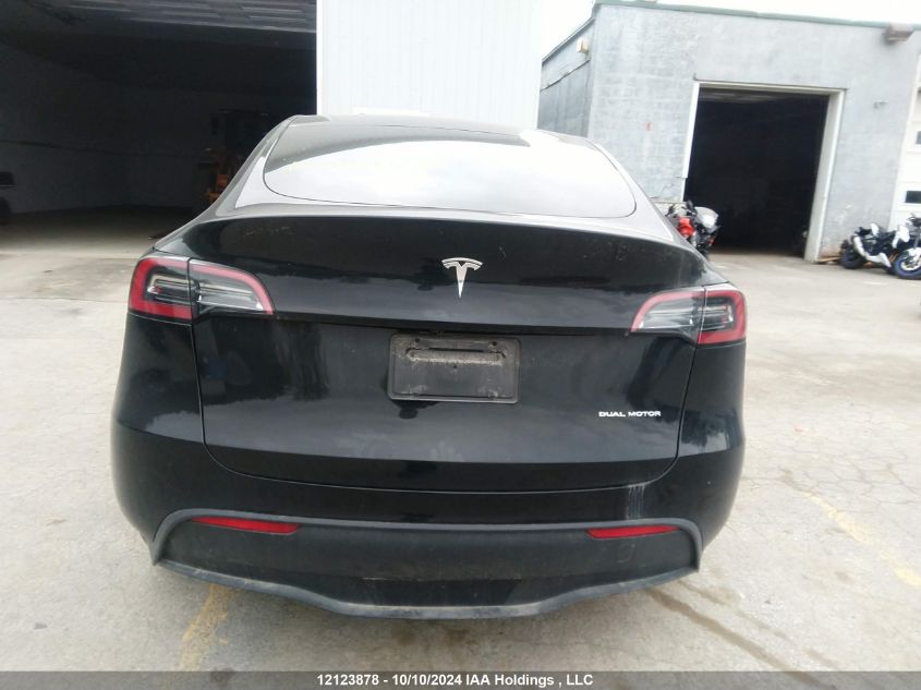 2024 Tesla Model Y VIN: 7SAYGDEE9RF110573 Lot: 12123878