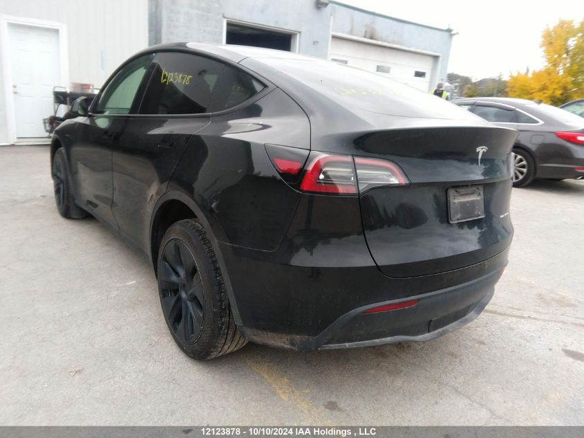 2024 Tesla Model Y VIN: 7SAYGDEE9RF110573 Lot: 12123878